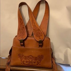 Gently used tooled leather Diesel purse